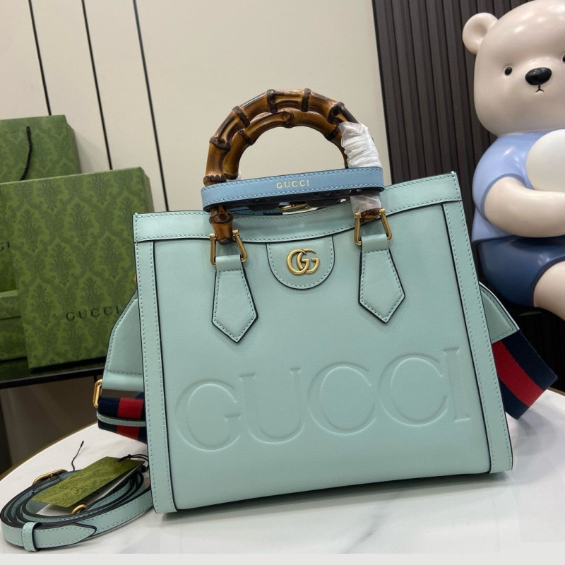G*u*i top handle bags